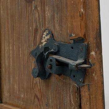 A painted wall cabinet, 19th century.