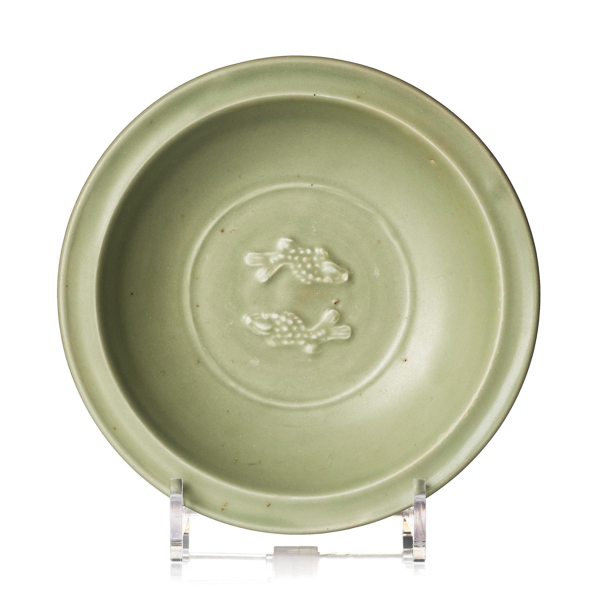 A celadon glazed double fish dish, Ming dynasty (1368-1644).