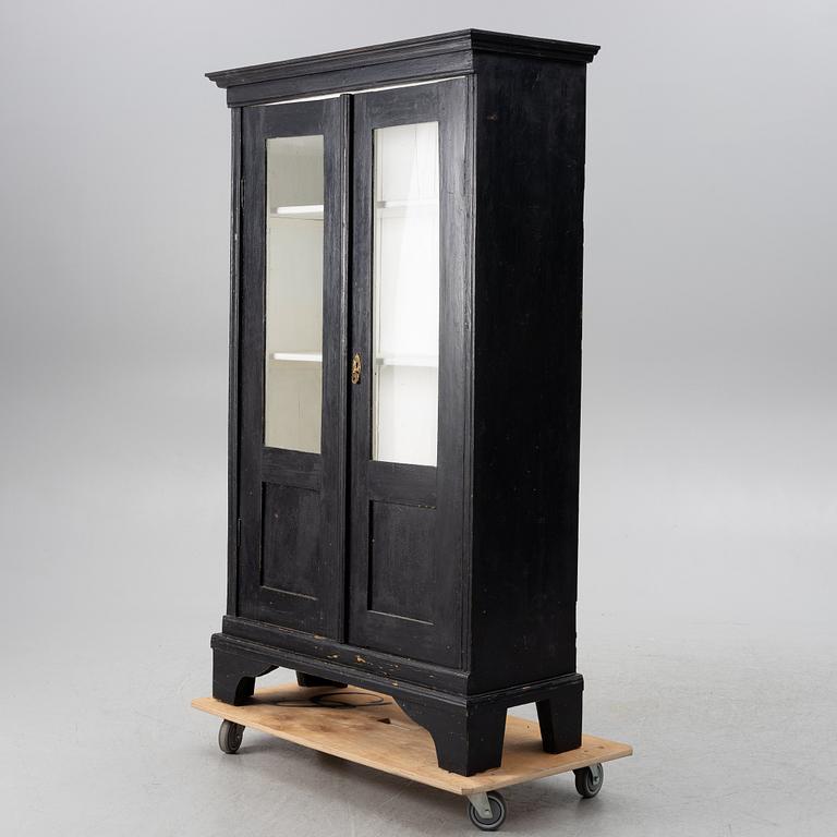 Display cabinet, circa 1900.