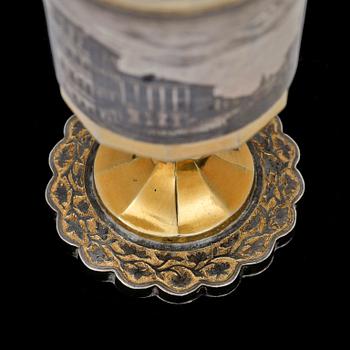 A Russian silver-gilt and niello vodka-cup, makers mark probably of Ivan Sujew, Wologda 1840's.