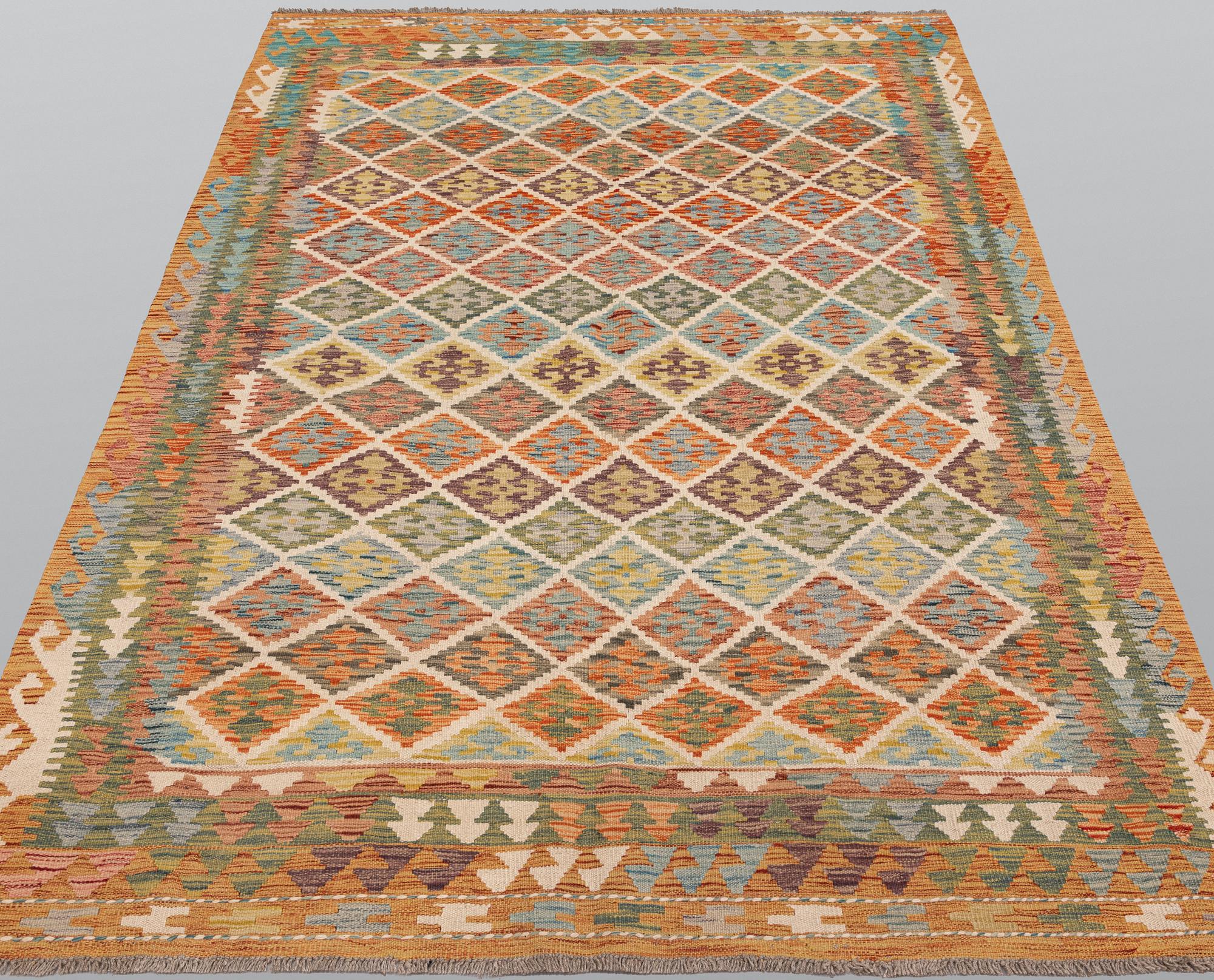 A Kilim rug, approx. 253 x 168 cm.