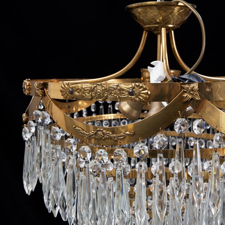 An end of the 20th Century ceiling light with prisms.