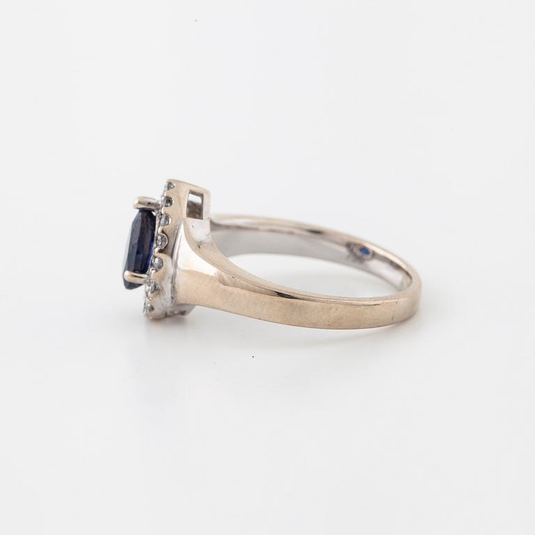 A sapphire and brilliant cut diamond ring.