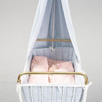 A children's or toddler's crib, the first half of the 20th century.