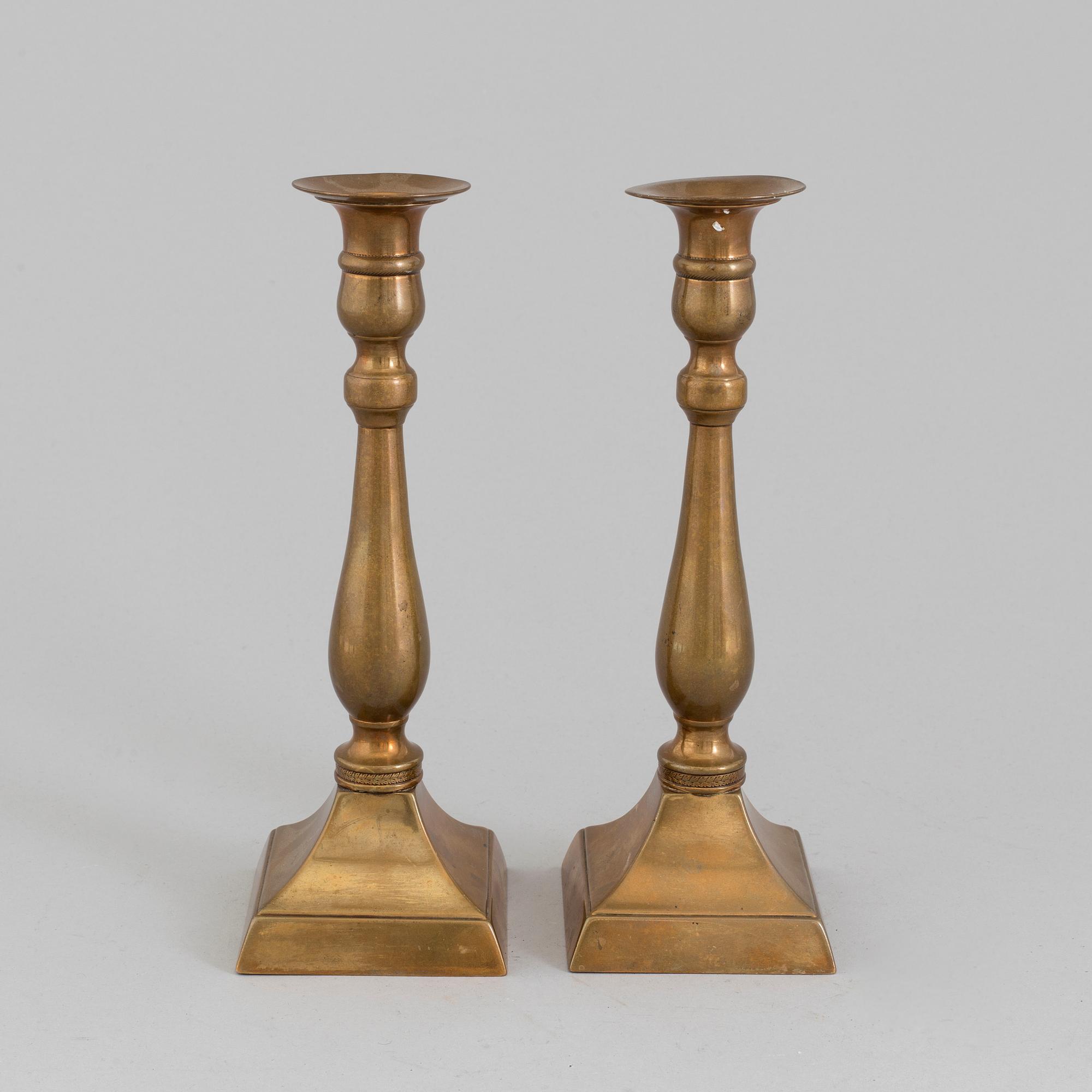 A PAIR OF BRONZE CANDLESTICKS, 19th century.