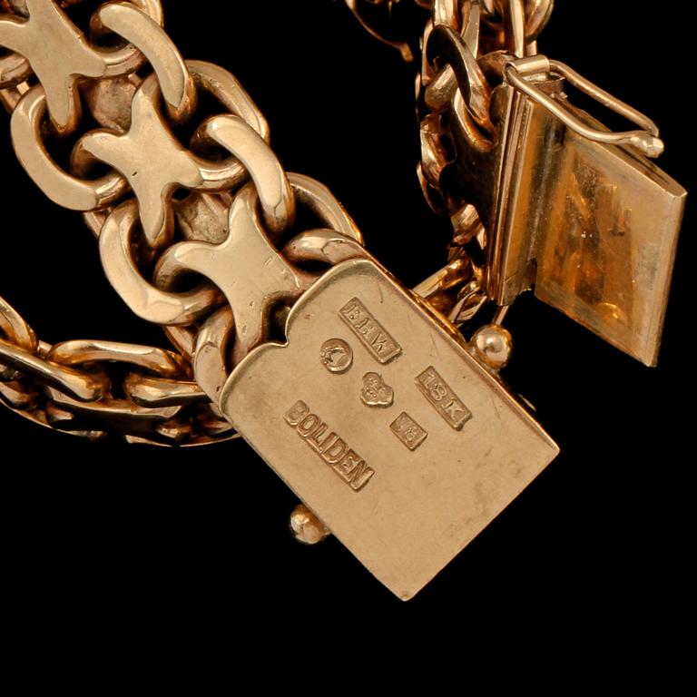 ARMLÄNK, 18k guld, Erik Wahlbeck, Stockholm, 1947. Vikt 38 g.
