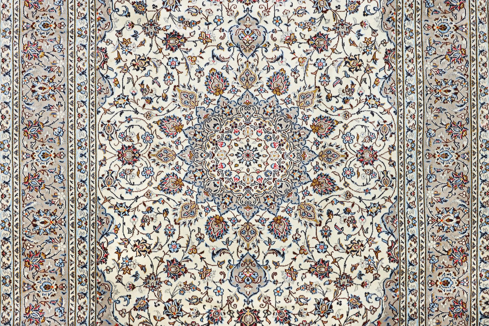 A Kashan carpet, c. 355 x 245 cm.