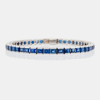 1180. A sapphire, circa 10.00 ct, line bracelet.