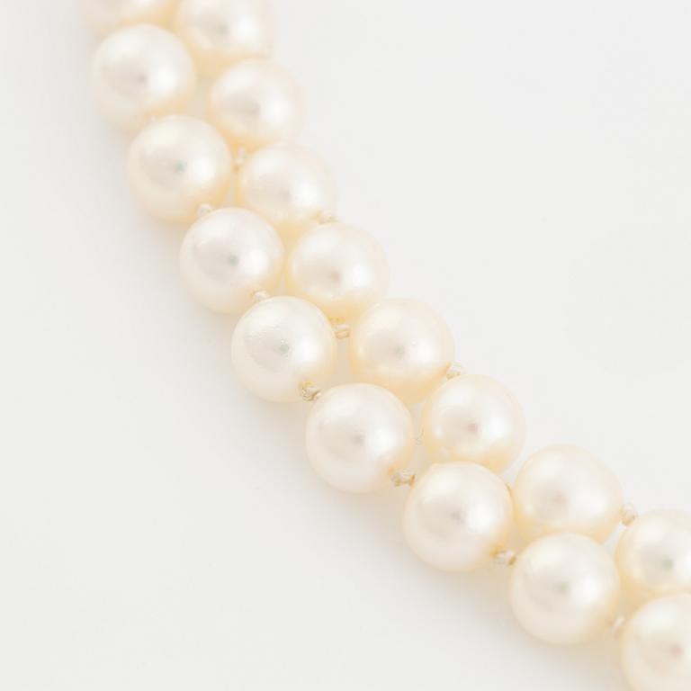 Two strand cultured pearl necklace, clasp with diamonds.