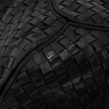 Bottega veneta, a black leather bag.