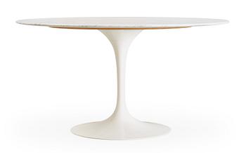 An Eero Saarinen 'Tulip' marble top table and six chairs, Knoll International.