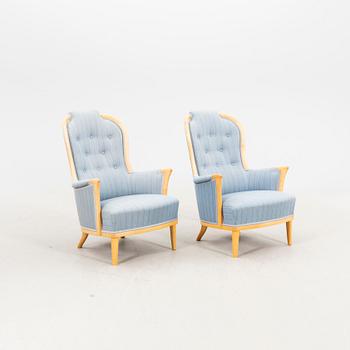 Carl Malmsten, a pair of Vår fru birch armchairs OH Sjögren alter part of the 20th century.