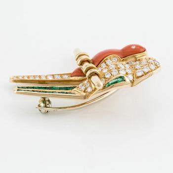 Brooch in the shape of parrots, 18K gold with coral, emeralds, and brilliant-cut diamonds.