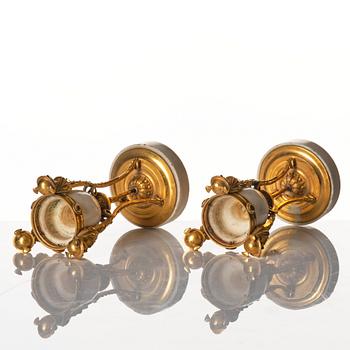 A pair of Louis XVI Cassolettes, white marble and gilt-bronze, around 1790.