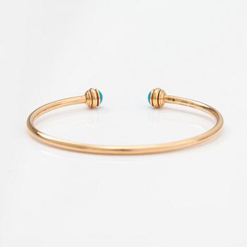 Piaget, A "Possession" bracelet made of 18K gold with turquoises. Marked Piaget R58367, 15.