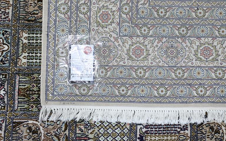 A silk carpet, Kashmir, approx. 370 x 272 cm.