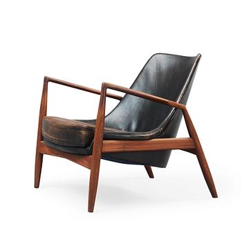 49. An Ib Kofod Larsen 'Sälen' teak and black leather armchair, OPE, Jönköping, Sweden 1950's-60's.