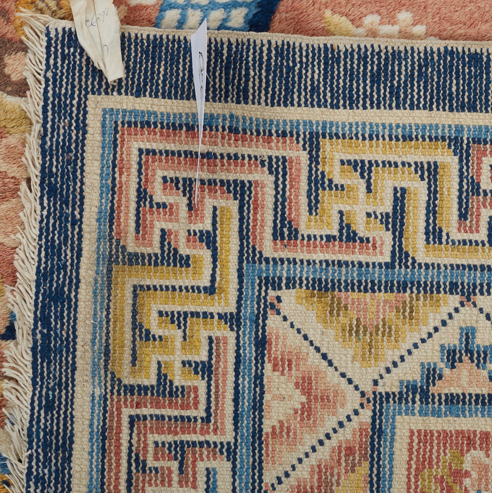 A CARPET, a semi-antique Ningxia, ca 197 x 127 cm.
