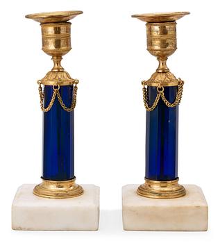 557. A pair of late Gustavian circa 1800 candlesticks.