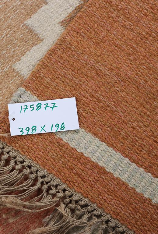 Anna-Johanna Ångtröm, a flat weave carpet, Sweden, signed Å, c. 309 x 198 cm.