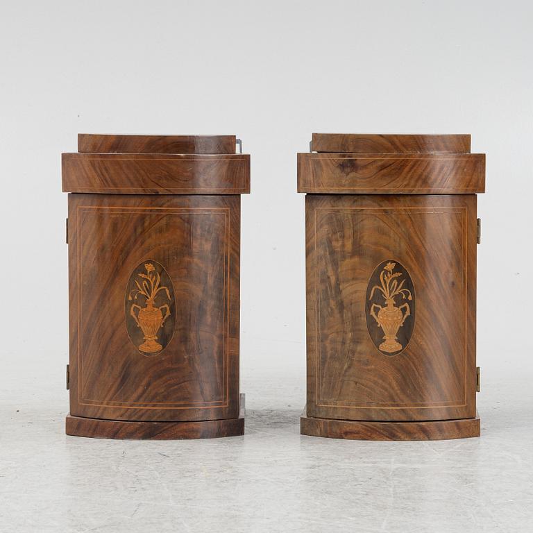 A pair of Empire style wall cabinets, around the year 1900.