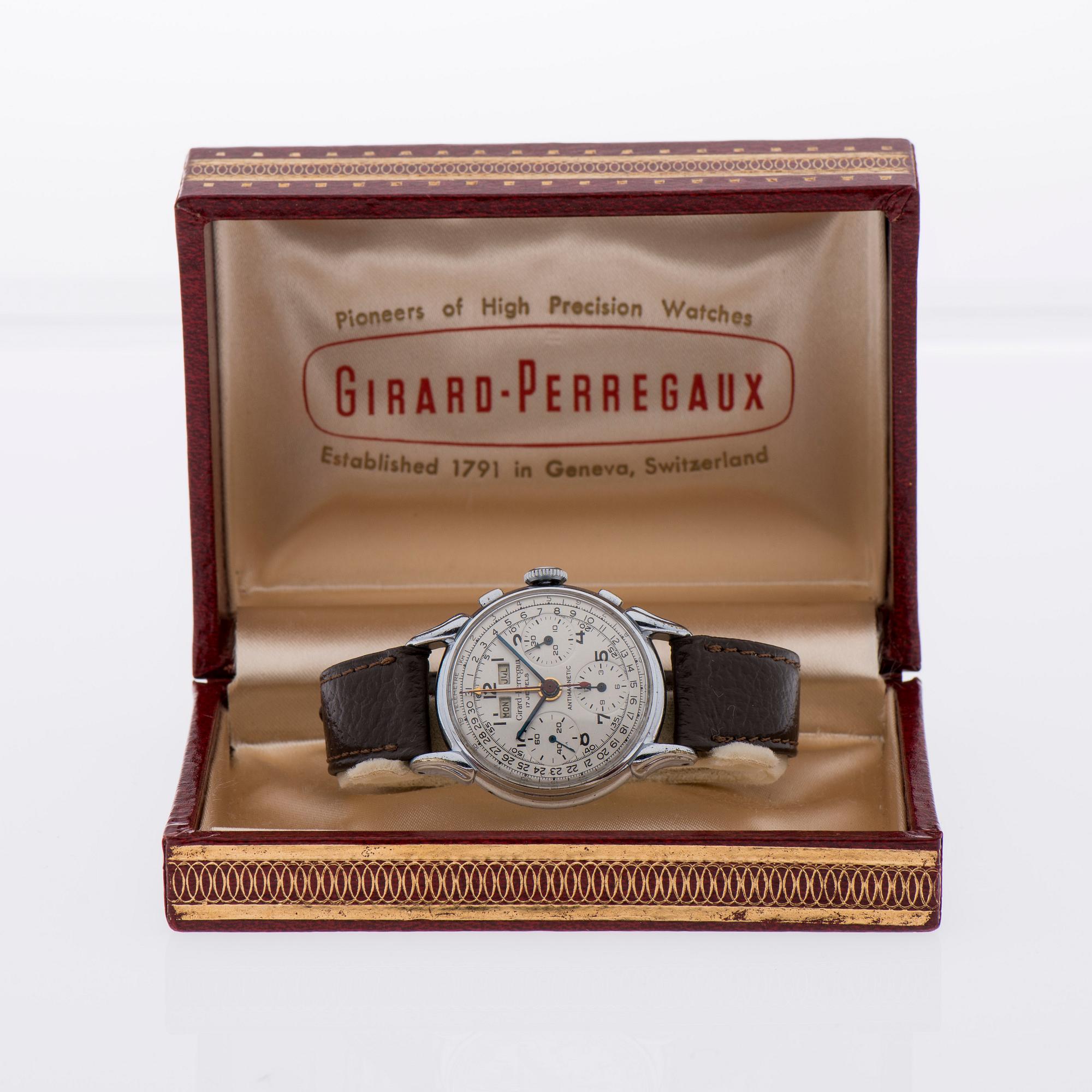 ARMBANDSUR, herr, Girard Perregaux "triple-date" kronograf, stål. Original box. 1940-tal.