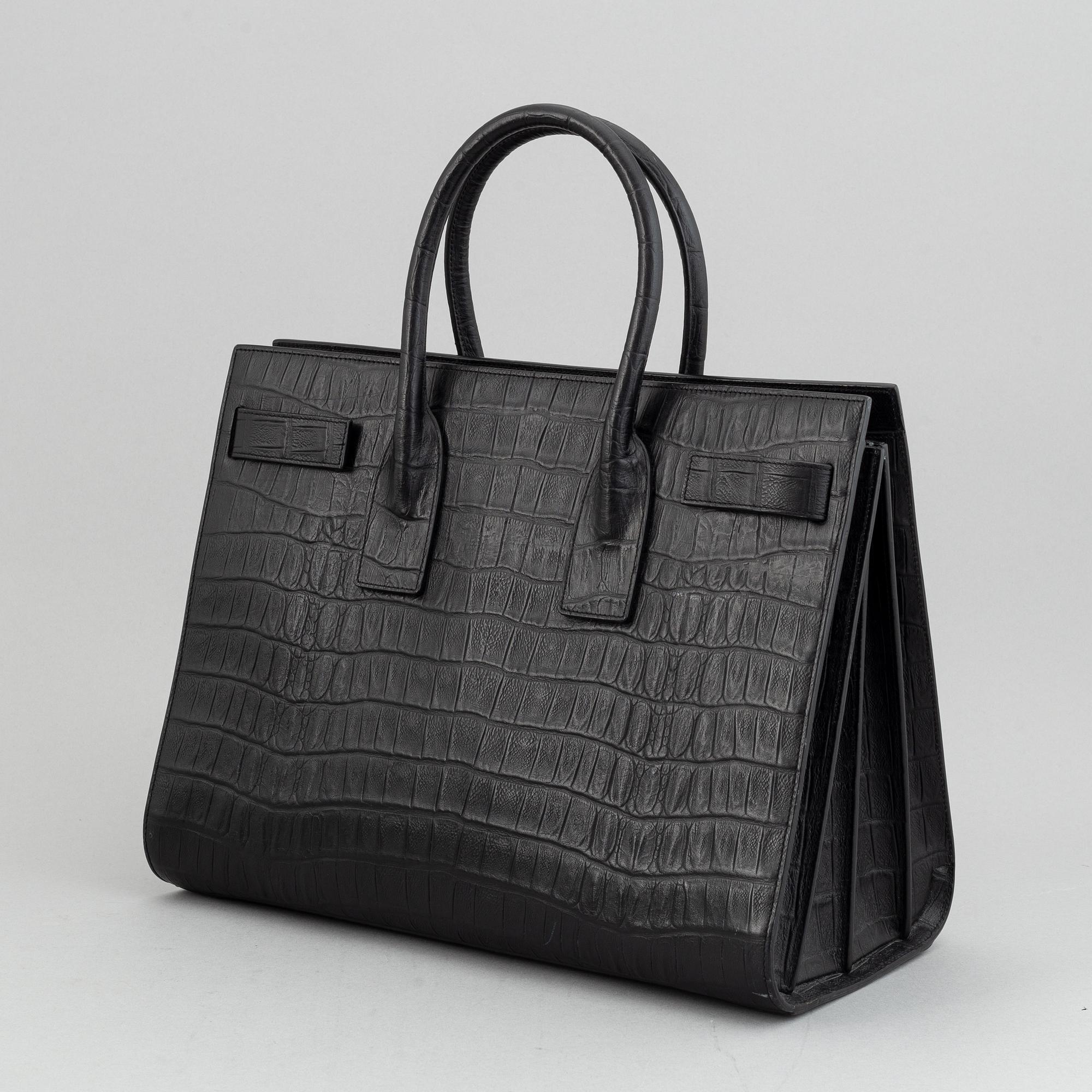 Yves Saint Laurent, a crocodile embossed 'Sac de Jour' leather handbag.
