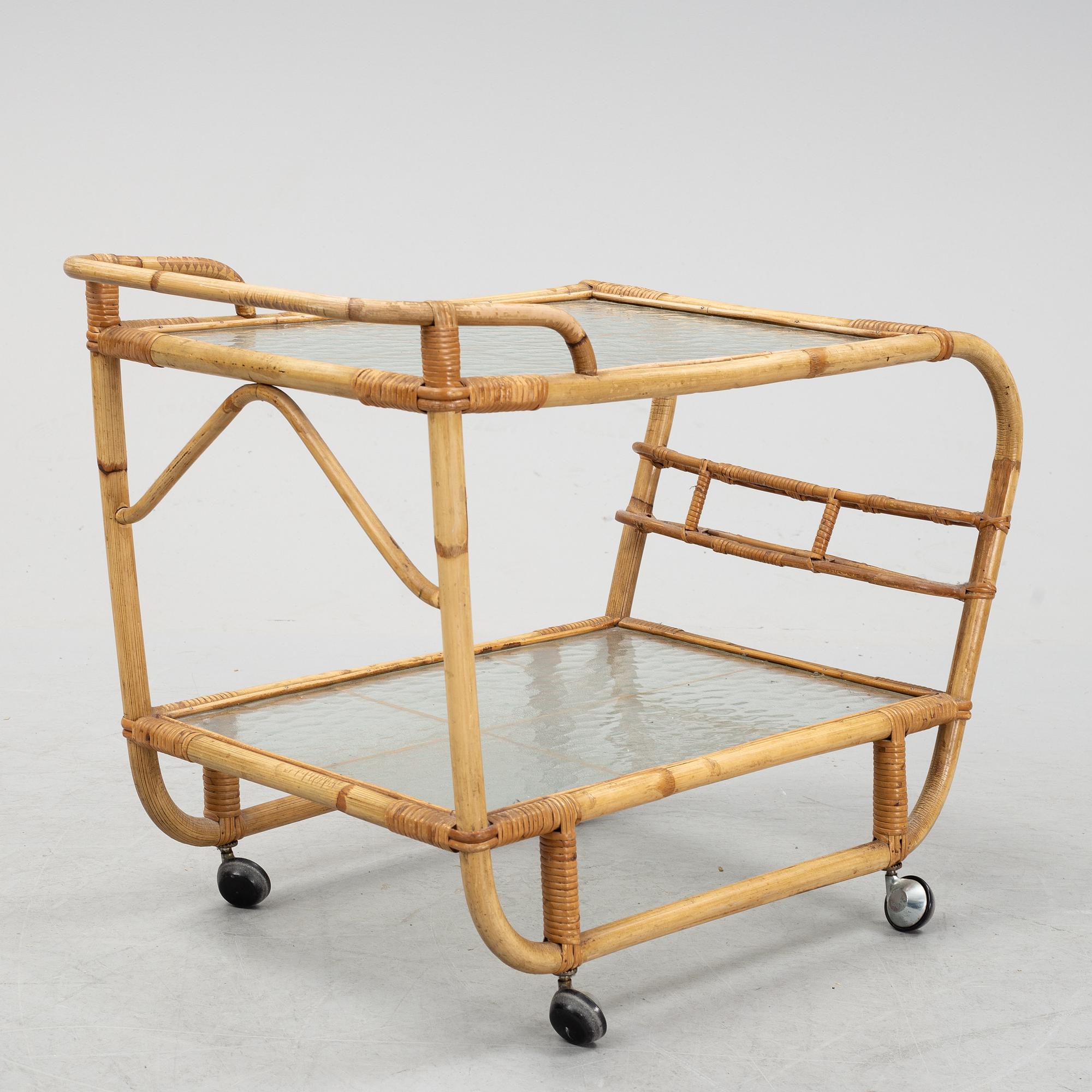 A second half of the 20th century rattan drinks trolley.