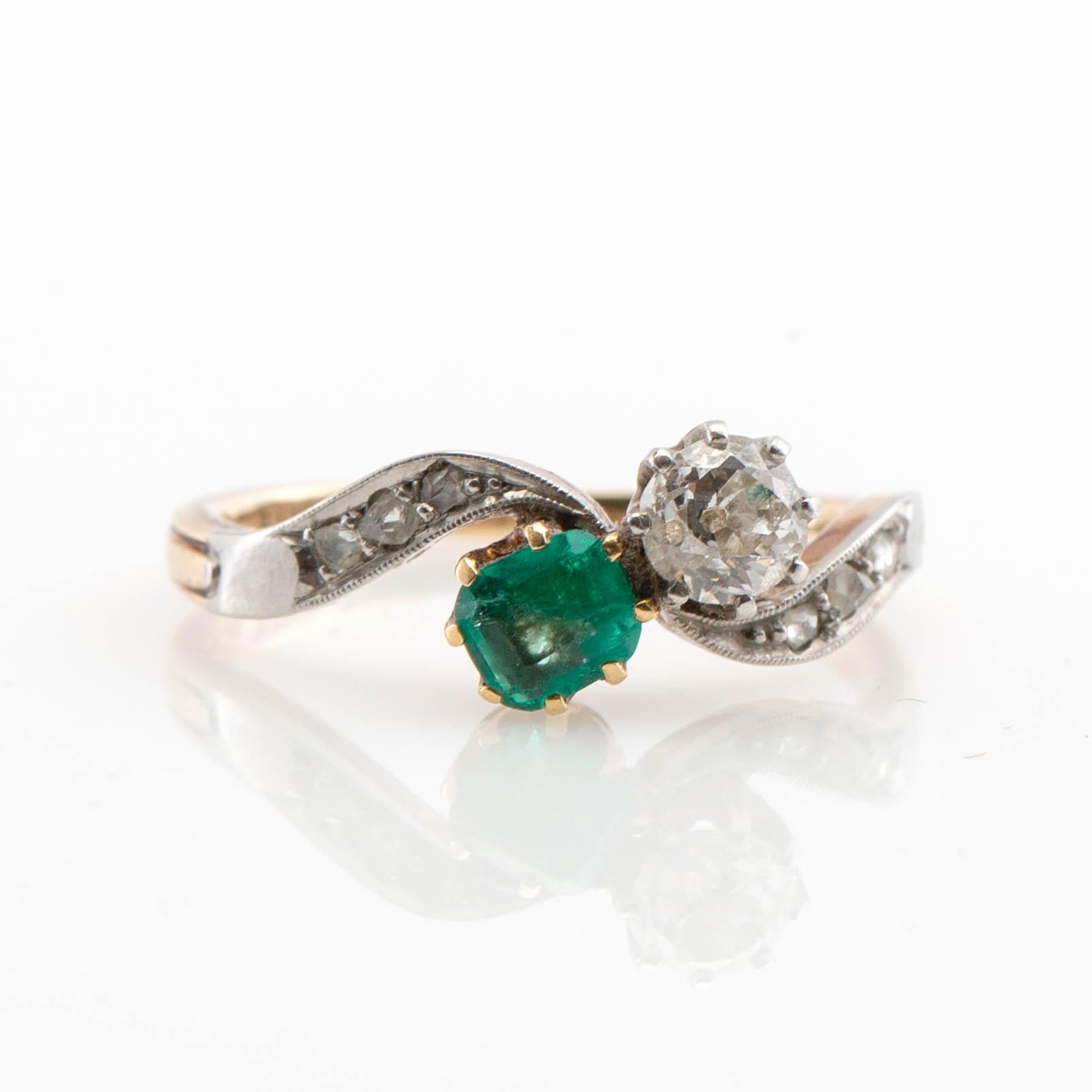 Ring, 14K gold with emerald and diamonds.