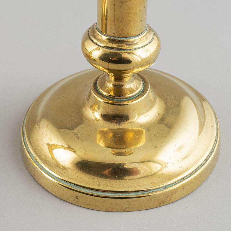 A pair of bronze Rmpire candlesticks, first half of he 19th century.