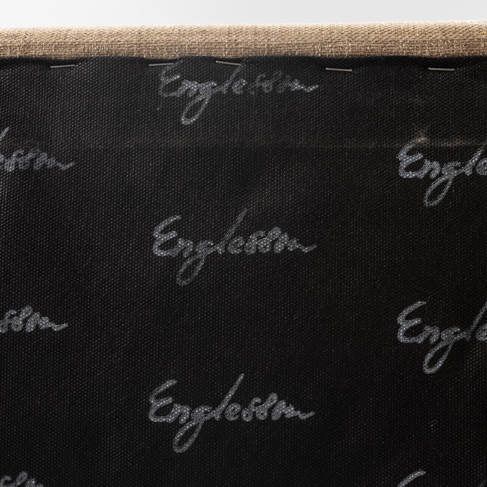 An armchair with footstool, Howard model, Englessons, 21st century.