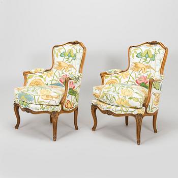 A pair of Louis XV-style armchairs, first half of the 20th century.