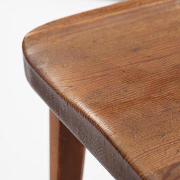 Axel Einar Hjorth, a set of three stained pine "Utö" chairs, Nordiska Kompaniet, Sweden, 1930s.