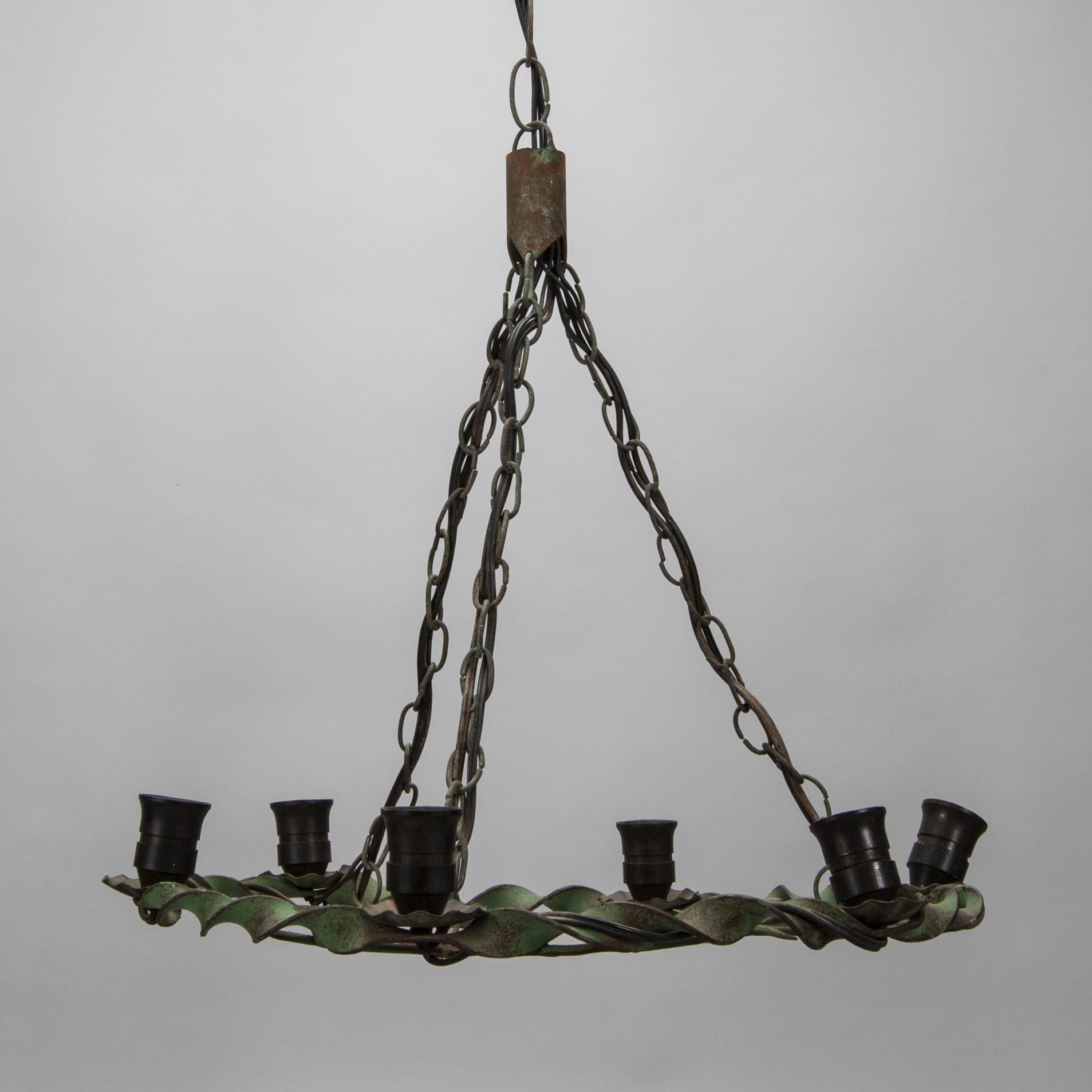 TAKAMPEL, smidesjärn, 1900-talets första hälft. Höjd 95 cm.