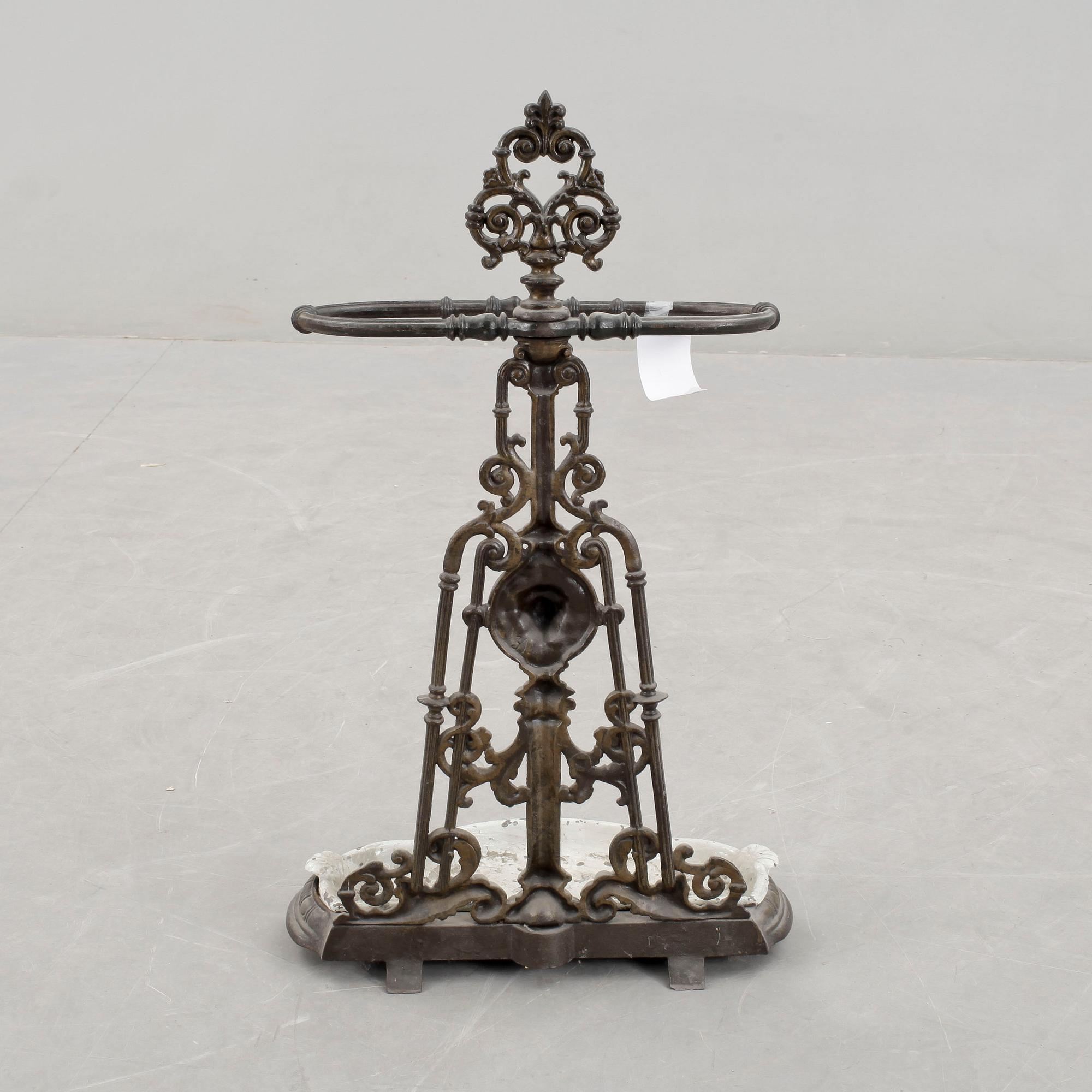 PARAPLYSTÄLL. Gjutjärn. 1900-tal.