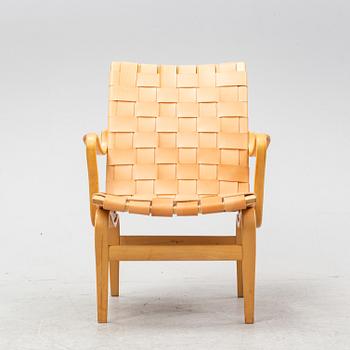 An 'Eva' easy chair by Bruno Mathsson for Firma Karl Mathsson dated 1971.