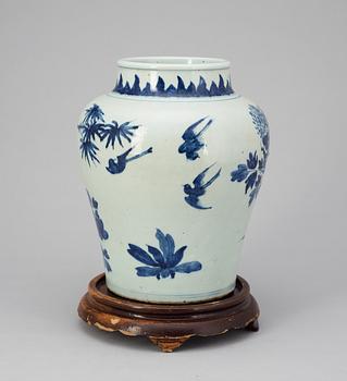 A blue and white Qing dynasty urn.