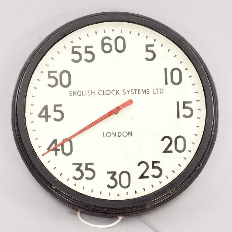 MINUTKLOCKA, "English Clock System Ltd" London. 1900-talets andra hälft.