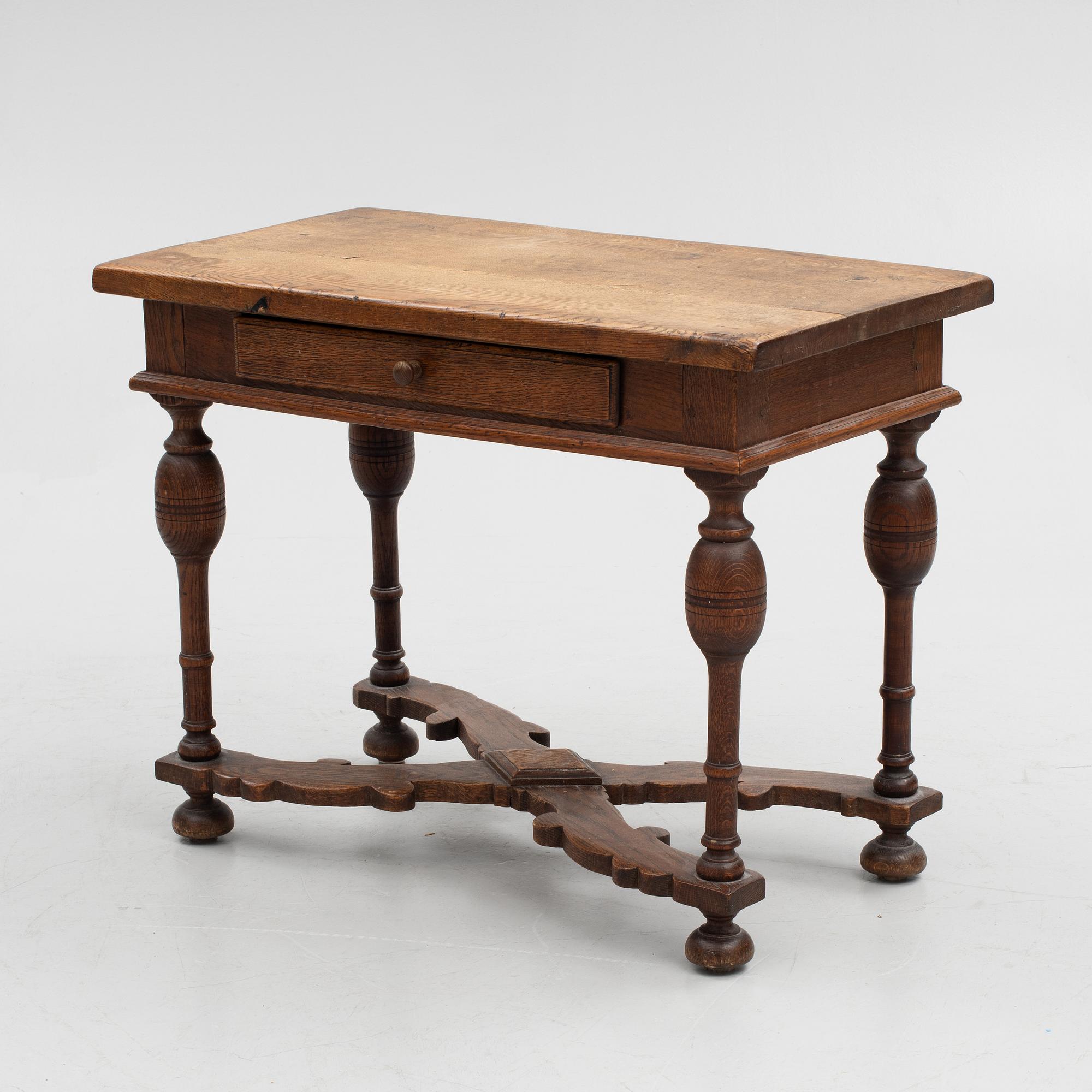 A table, late 19th century. Baroque style.