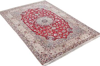 An Esfahan carpet with silk warp, c. 298 x 206 cm.