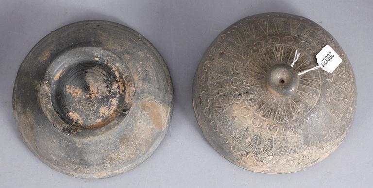 Two Korean stownware bowels with doomed, decorated covers, Korea, Silla period (668-935).