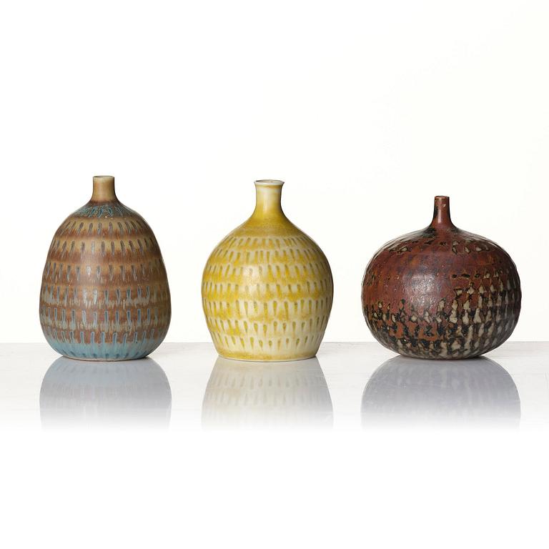 Stig Lindberg, a set of 7 stoneware miniature vases and 5 bowls, Gustavsberg Studio, Sweden, 1955-68.