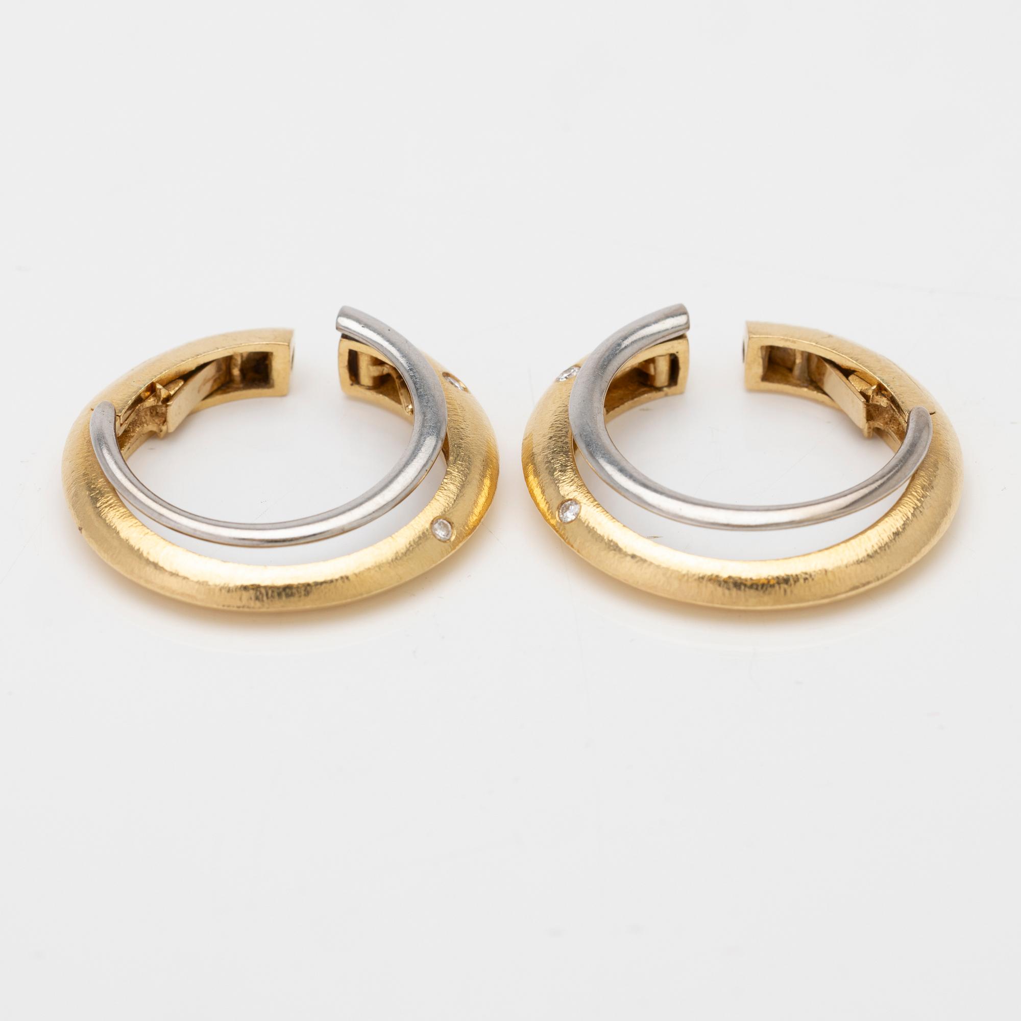 Ole Lynggaard, 18K gold and diamond hoop earrings.