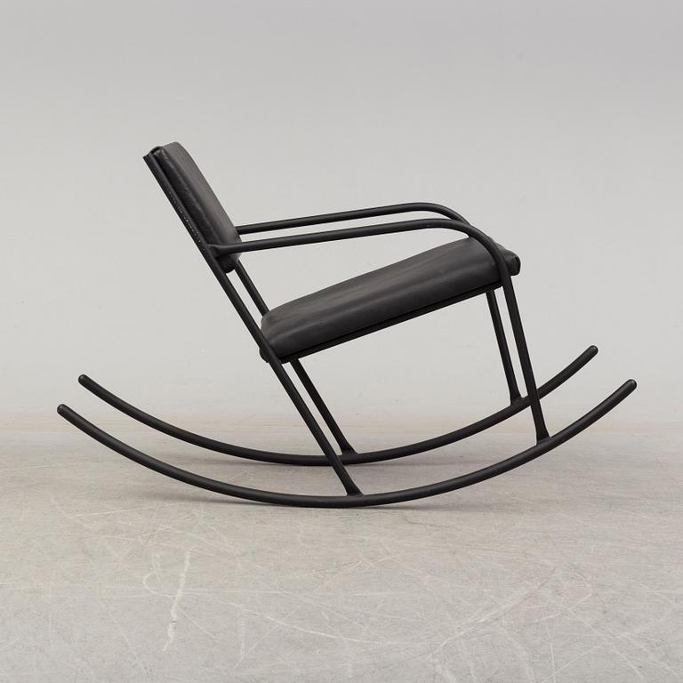 JONAS BOHLIN, a steel and black leather rocking chair, Jonas Bohlin Design AB, Sweden 1997.