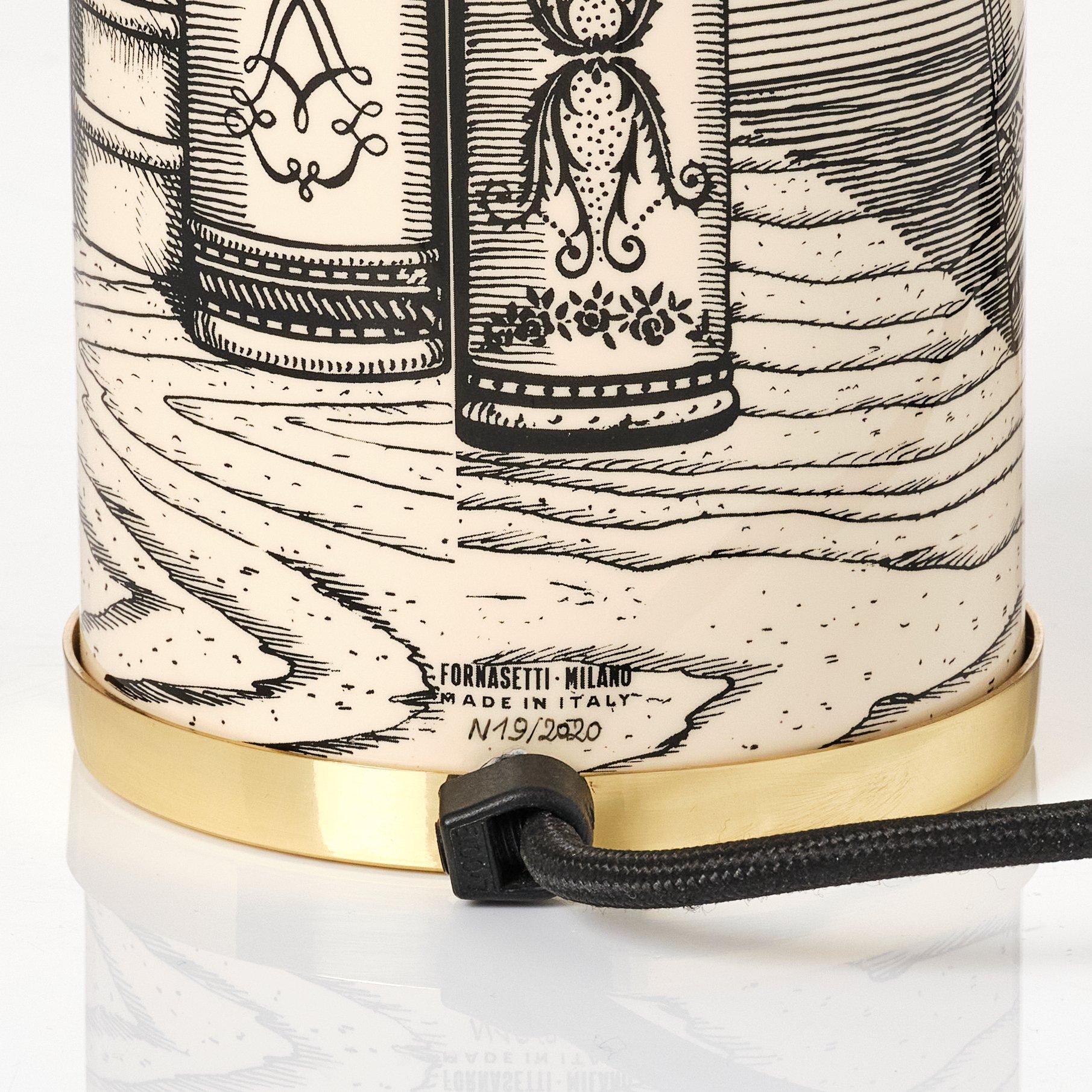 Piero Fornasetti, a 'Libri' table lamp, Fornasetti, Milan, Italy 2020.