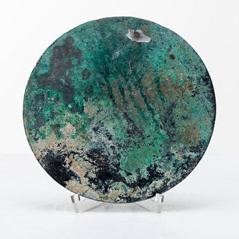 A broze mirror, presumably Tang dynasty (618-907 A.D.).