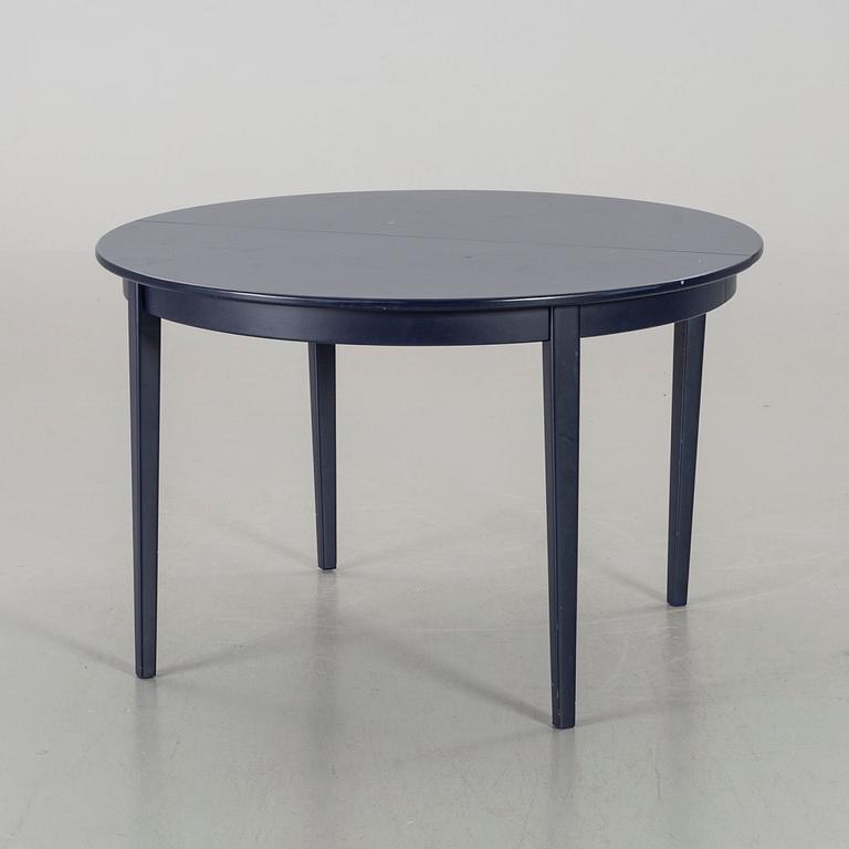 A table and four chair, "Epok" by IKEA from the second half of the 20th century.