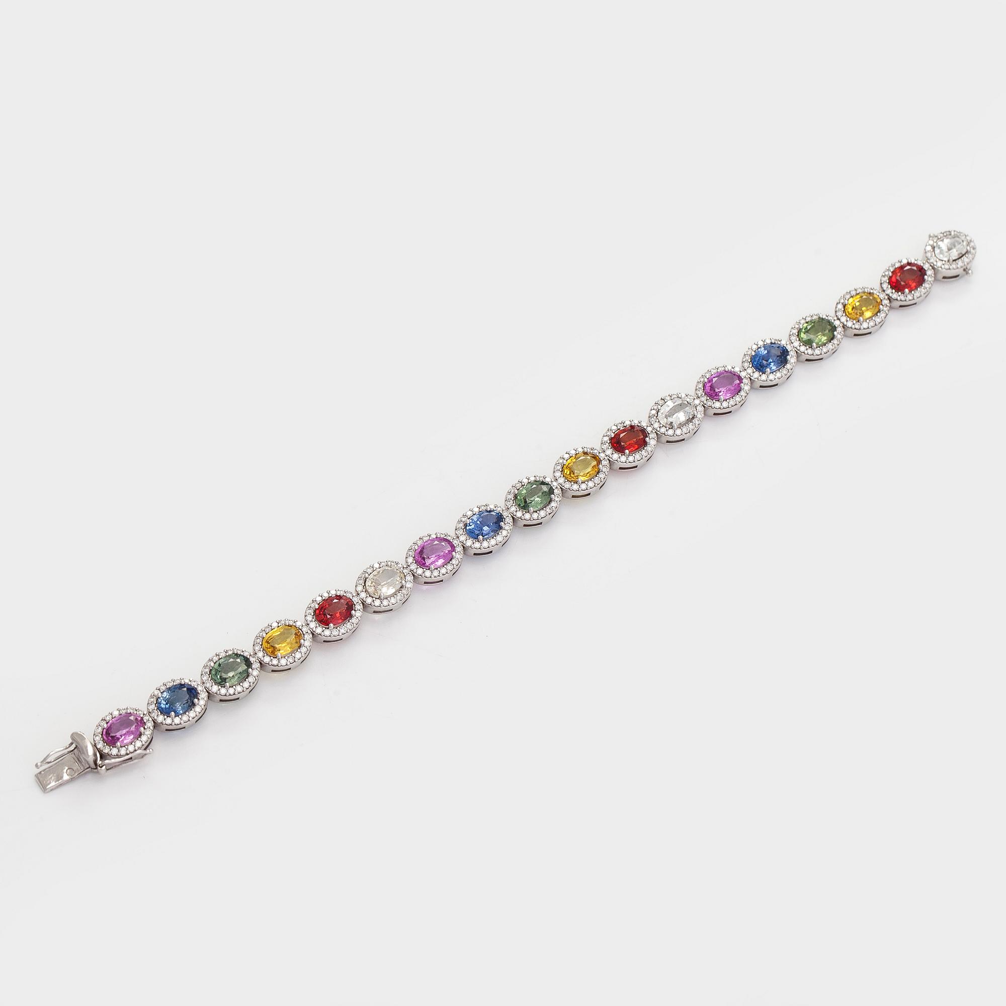 A multi-colour sapphire and diamond bracelet in 14K whitegold.