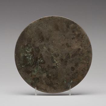 A large bronze mirror, Ming dynasty or earlier.