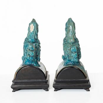 Two turquoise galzed roof tile figures of birds, late Ming dynasty.